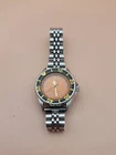 Casio Orange Quartz 100M Diver's LQ351W Women's Wristwatch Pre-owned. Price: $201.89.