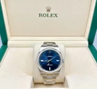 Rolex Oyster Perpetual 114300 39MM Blue Dial Stainless Steel Pre-owned. Price: $8495.00.