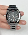 Seiko 5M65-0AB0 Gmt Stainless Steel Automatic Mens Watch All Black Pre-owned. Price: $285.00.