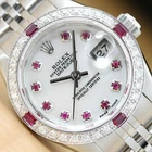 Rolex Ladies Datejust 69174 Mother Of Pearl Ruby Diamond 18K White Gold/ss Watch Pre-owned. Price: $6290.00.