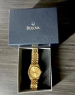 Bulova Marine Star 92D25 Mens Day Date Gold Tone Quartz Watch New With Box. Price: $149.00.