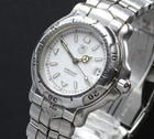 New Batt Mint Vintage Heuer WH1211 35MM White Dial Qz Date Men's Watch Pre-owned. Price: $349.99.