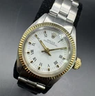 Vintage 1979 Ladies Rolex Oyster Perpetual 6718 Steel & Gold Pre-owned. Price: $3995.00.